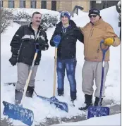  ?? JOnATHAn RILey/TC MedIA ?? Bassam and Boulos Herz helped Brian Cormier clean off the steps of Immaculate Conception Catholic Church Tuesday. The Herzs arrived in Truro last fall and say they experience­d a “little” snow in Syria, but nothing like this.