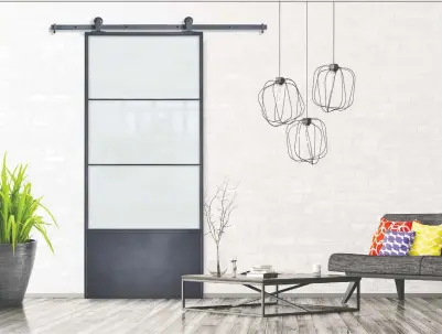  ??  ?? Something as simple as a new interior door — like the Indoor Studio’s Cartier Metal Barn Door Kit — can help upgrade the look of a dull hallway.
HOMEDEPOT.CA