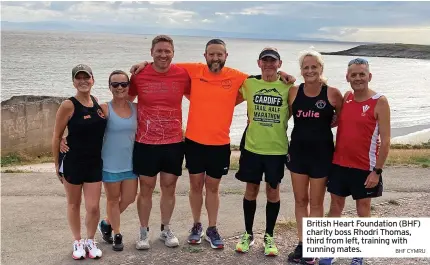 ?? BHF CYMRU ?? British Heart Foundation (BHF) charity boss Rhodri Thomas, third from left, training with running mates.