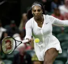  ?? PHOTO: GETTY IMAGES ?? Bowing out . . . Serena Williams plays a forehand during her Wimbledon firstround loss to France’s Harmony Tan in June.