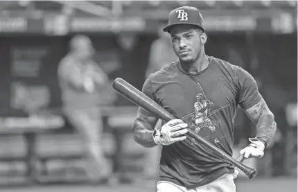  ?? STEVE NESIUS/AP ?? Rays shortstop Wander Franco steps out of the batting cage before a game against the Marlins on Sept. 24. Franco batted .288 with seven homers and an .810 OPS in 70 games this season.