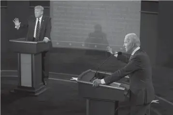  ?? MORRY GASH/AP ?? President Trump and then-Democratic presidenti­al nominee Joe Biden spar during a debate Sept. 29 in Cleveland.