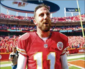  ?? JAMIE SQUIRE / GETTY IMAGES ?? Chiefs QB Alex Smith, coming off the best season of his 13-year career, is expected to be traded to the Redskins when the league’s new year begins in March.