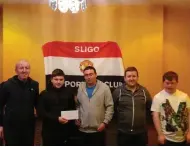  ??  ?? 2nd prize winner from the Sligo Branch of the Manchester Utd Supporters Club raffle Jason Flanagan receiving cheque from committee members.