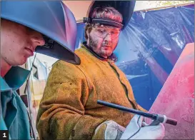  ?? Bobby Block/The Signal ?? (1) College of the Canyons Welding Lab Technician Ian Happel shows local student Ian Kingsbury how to use a TIG welder at the 2019 STREAM Manufactur­ing Expo held at the Santa Clarita Sports Complex Friday afternoon.