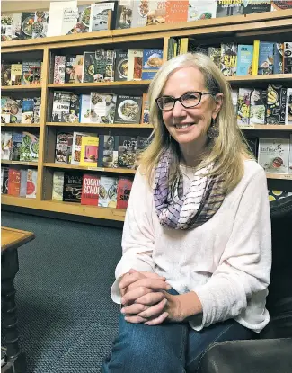  ?? JUSTIN HORWATH THE NEW MEXICAN ?? Jean Devine, the new owner of Garcia Street Books, 376 Garcia St., said her goal is to ‘make this a place the community loves.’