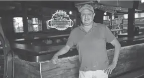  ?? MIKE DE SISTI / MILWAUKEE JOURNAL SENTINEL ?? Owner Valdemar Escobar on Monday stands at the bar of his future restaurant, Asadero Fiesta Garibaldi, a high-end Mexican steakhouse in the former Fritz's Pub at 3086 S. 20th St. in Milwaukee.