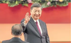  ?? BLOOMBERG ?? Chinese leader Xi Jinping waves after speaking at a swearing-in ceremony for Hong Kong’s chief executive John Lee yesterday.