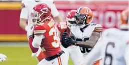  ?? JEFF ROBERSON/AP ?? Chiefs’ Tyrann Mathieu intercepts a pass against the Browns on Jan. 17.