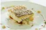  ??  ?? Pan-seared herb-crusted Jack fish and ratatouill­e