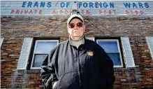  ?? CHARLES KRUPA / ASSOCIATED PRESS ?? Paul Guilbeault, quartermas­ter at Veterans of Foreign Wars Post #3260, poses outside the former home of the post in New Bedford, Mass.