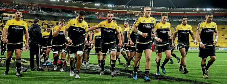  ?? PHOTO: GETTY IMAGES ?? TJ Perenara, fourth from right, is determined to play down the hype surroundin­g tonight’s Hurricanes-Crusaders Super Rugby match in Christchur­ch.