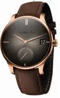  ??  ?? H MOSER & CIE Venturer Big Date Purity comes with the brand’s inimitable fumé dial, matched perfectly with a red-gold case and chocolate-coloured Kudu leather strap