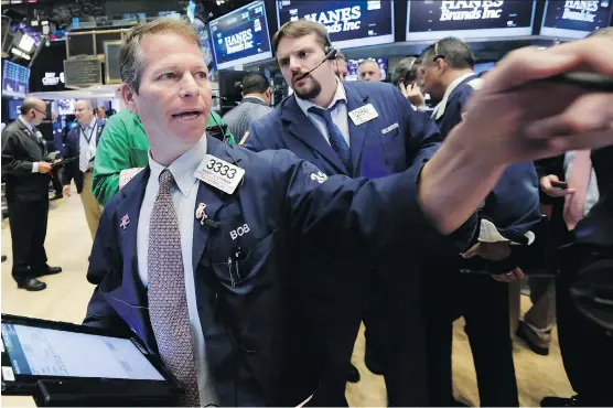  ?? RICHARD DREW/THE ASSOCIATED PRESS ?? Much like the weather of late, stock market action this past Friday sent a chill down many investors' screens, suggesting that cold winds may be on the immediate horizon. One of the main stumbling blocks centres around the fact that today's market has...