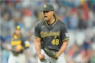  ?? WILFREDO LEE/AP ?? Pirates starting pitcher Luis Ortiz reacts as he finishes the 11th inning Thursday against the Marlins in Miami. The Pirates beat the Marlins 6-5 in 12 innings.