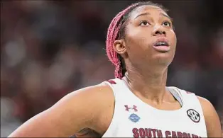  ?? Andy Lyons / Getty Images ?? Aliyah Boston and South Carolina have been No. 1 in the AP poll all season thanks in part to a defense that allowed just 50.5 points per game this season.