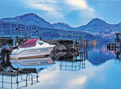  ?? ?? Scuanptdio­wn nin Bhoeartes on Loch Lomond at Inversnaid by Chris Elder