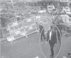  ?? (SABAH VIA AP ) ?? In a still image from surveillan­ce camera footage taken Oct. 2, 2018, and published Thursday, Oct. 18, 2018, by the progovernm­ent Turkish newspaper Sabah, a man previously seen with Saudi Crown Prince Mohammed bin Salman’s entourage during an April trip to the U.S. walks toward the Saudi Consulate in Istanbul just before writer Jamal Khashoggi disappeare­d there.