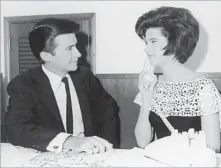  ?? Hulton Archive Getty Images ?? PRIME TIME Jimmy O’Neill interviews country-western pianist and singer Linda
Gail Lewis, the sister of rockabilly pioneer Jerry Lee Lewis.