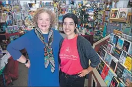  ?? Photog r aphs by Francine Orr Los Angeles Times ?? OWNER Maureen Palacios, left, and daughter Jessica, 26, at Once Upon a Time.