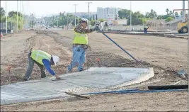  ?? Buy this photo at YumaSun.com FILE PHOTO BY RANDY HOEFT/YUMA SUN ?? UNLIKE MAJOR RENOVATION­S SUCH AS THE 24TH STREET widening project (above), many city roadways will undergo patchwork repairs for the time being.