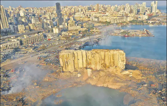  ?? AP ?? EPICENTRE OF THE BLAST: An aerial image shows the scene of destructio­n at the seaport of Beirut in Lebanon on Wednesday, a day after the explosion.