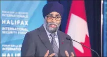  ?? CP PHOTO ?? Canadian Defence Minister Harjit Sajjan fields questions at a news conference at the Halifax Internatio­nal Security Forum in Halifax on Friday.