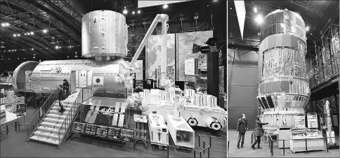  ?? — Photos by Taku Yaginuma-Special to The Yomiuri Shimbun ?? (Left) A full-size replica of the Internatio­nal Space Station’s Japanese experiment module Kibo. • (Right) A test model of the H-2 Transfer Vehicle Kounotori.