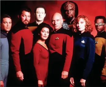  ?? ?? THE FINAL FRONTIER: Marina Sirtis as Deanna Troi and Sir Patrick Stewart as Captain Jean-luc Picard, centre, with the cast of Star Trek: The Next Generation