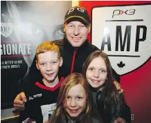  ?? RYAN MCLEOD ?? AMP chair Brad Layzell is pictured at Winsport with his kids Xavier, Aimee and Ella. AMP is a new private minor hockey organizati­on that will offer kids a scientific approach to the game with instructio­n by highly qualified coaches. Registrati­on will...