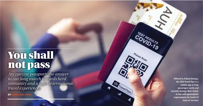  ??  ?? Offered to Etihad Airways, the IATA Travel Pass is a mobile app to help passengers easily and securely manage their travel, in line with government requiremen­ts for Covid-19 tests or vaccines