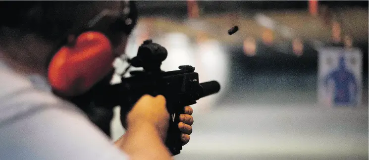  ?? JIM WATSON / AFP / GETTY IMAGES ?? Many liberals take for granted that guns dramatical­ly increase domestic violence, and people who uphold the right of effective self- defence are redneck losers, John Robson writes.