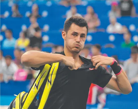  ?? Picture: AFP PHOTO ?? Bernard Tomic’s hopes of qualifying for the Australian Open remain up in the air following a sorry 2017 campaign.