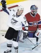  ?? CANADIAN PRESS FILE PHOTO ?? Tampa Bay Lightning’s Chris Gratton celebrates a goal on Montreal Canadiens superstar goaltender Carey Price during a Dec. 11, 2007, game.