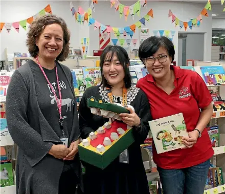  ?? ZIZI SPARKS/STUFF ?? Takapuna Library children’s librarian Lisa Dam, left, with Korean Rhymetime deliverer Sora Chun and Kuddles worker Mary Kim.