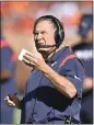  ?? DAVID RICHARD — AP ?? New England head coach Bill Belichick moved into a tie for second place on the all-time victories list on Sunday.