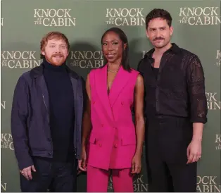  ?? PHOTO BY VIANNEY LE CAER — INVISION — AP ?? Rupert Grint, from left, Nikki Amuka-Bird, and Ben Aldridge at the special screening of the film ‘Knock at the Cabin’ in London on Jan. 25.