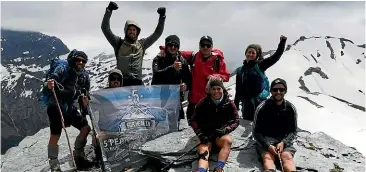  ??  ?? The eight South Canterbury climbers on top of Dragonfly Peak, their hardest day of the five.