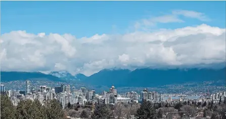  ?? DARRYL DYCK THE CANADIAN PRESS ?? In 2019, home prices in Greater Vancouver are forecast to go up by just 0.6 per cent to $1.29 million.
