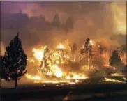  ?? CALIFORNIA HIGHWAY PATROL VIA AP ?? A Klamathon Fire burns in Hornbrook, Calif. A local California official says a deadly blaze burning near the Oregon border moved swiftly through the rural area that is home to many retirees. Siskiyou County Board of Supervisor­s chair Ray Haupt says the...