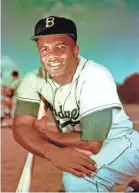  ?? 1952 AP PHOTO ?? Brooklyn Dodgers baseball player Jackie Robinson went to his first spring training in 1946.