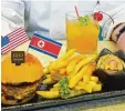  ?? Foto: dpa ?? Mit Pommes und Kimchi: Der spezielle Burger für das Gipfeltref­fen.