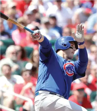  ?? AP ?? The Cubs’ Anthony Rizzo smacks an RBI single in the second inning Saturday in St. Louis.