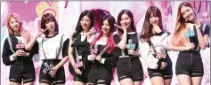  ??  ?? MBK Entertainm­ent’s girl group DIA pose, from left, Huihyeon, Eunice, Chaeyeon, Eunchae, Yebin, Jenny and Eunjin during a press conference at Blue Square Samsung Card Hall in Hannam, eastern Seoul.