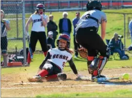  ?? SAM STEWART - DIGITAL FIRST MEDIA ?? Boyertown’s Lauren Ferguson slides into home safely on Alyssa Ackerson’s safety squeeze in the first inning.