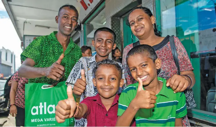  ?? Photo: Leon Lord ?? Back (from left): Ronesh Naidu (father), Rishaal Naidu 13, Radhika Goundar (mother) ,(front from left) Ranit Naidu 7 and Rivnesh Naidu 9, shopping in Suva on January 26, 2023.