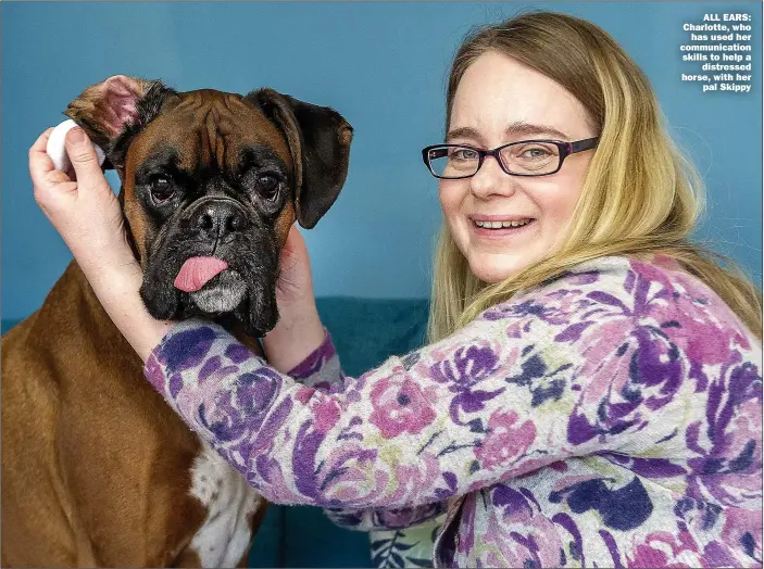  ?? Picture: JONATHAN BUCKMASTER ?? ALL EARS: Charlotte, who has used her communicat­ion skills to help a distressed horse, with her pal Skippy