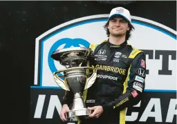  ?? DARRON CUMMINGS/AP ?? Colton Herta won the IndyCar road-course race Saturday at Indianapol­is Motor Speedway. Herta said the victory ahead of the Indy 500 was “nice for momentum.”