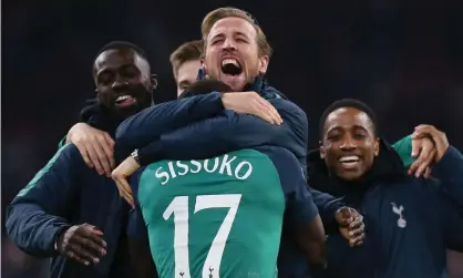  ??  ?? Harry Kane – who was watching from the stands – celebrates with Moussa Sissoko after Spurs beat Ajax in the Champions League semifinal. Photograph: Tottenham Hotspur FC via Getty Images