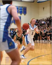  ?? BRIAN FISHER — FOR THE NEWS-HERALD ?? NDCL’s Angelo Tamburrino passes Feb. 2against Lake Catholic.